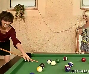 Grandma and teen sharing a dildo